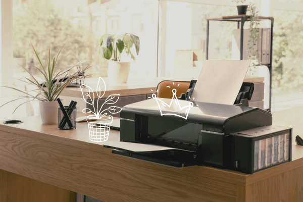 uma sala de escritorio com um impressora sobre a mesa - impressora com melhor custo-beneficio